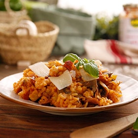 Arroz con pollo y tomate